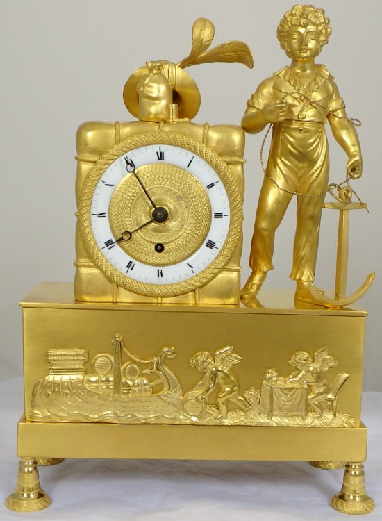 A small English Antique Regency nautical themed mantel clock Ian
